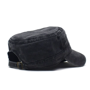 Detail view of washed black cotton military cap with metal eyelets and adjustable back strap