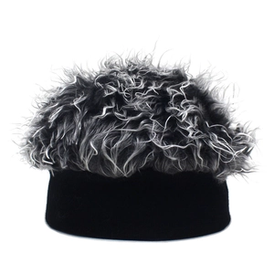 Macro shot of fluffy grey synthetic hair texture on a black knitted novelty beanie cap
