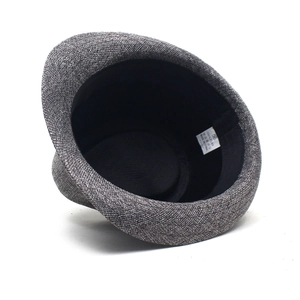 Detailed close-up of 100% flax linen fedora inner lining with size 58 label
