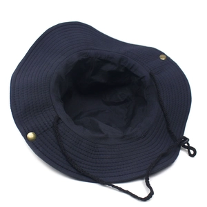 Detail of navy cotton canvas sun hat with adjustable chin strap and side metal snaps