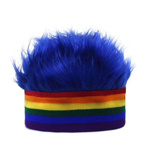 Rainbow striped knit hat featuring a fluffy bright blue wig top for party costumes