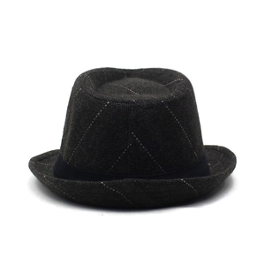 Detailed close-up of herringbone texture and black ribbon on a gray fedora hat