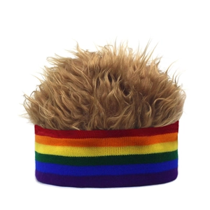 Detail of colorful rainbow knit headband with brown faux fur wig for party costumes