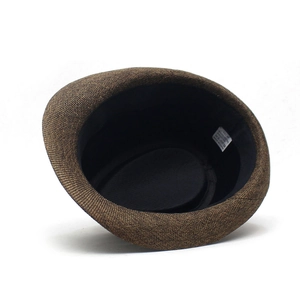 Detail shot of the internal lining and size label inside the brown linen jazz hat
