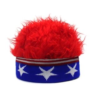Detail of USA flag themed knit beanie with vibrant red faux fur hair and white stars