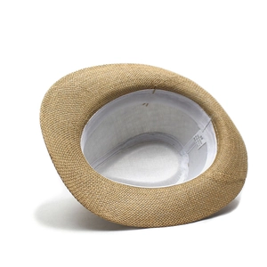 Detail view of the breathable straw hat interior showing size 58 label and sweatband