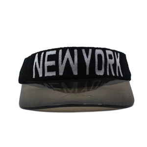 Close-up of NEW YORK lettering on black knit band with grey translucent visor