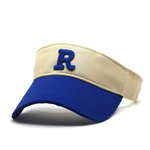 Close-up of contrast color cotton visor with blue towel embroidered letter R detail