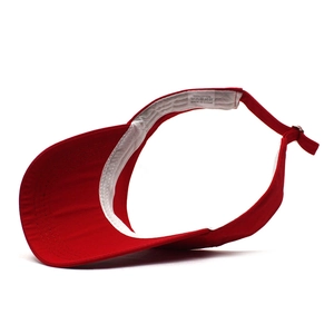 Detail view of red 100% cotton sun visor showing the interior sweatband and structure