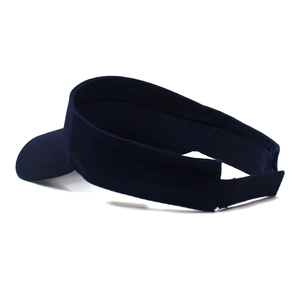Detail view of the adjustable velcro strap on the back of this navy blue cotton sun visor hat