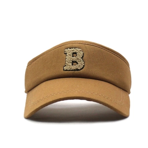 Detailed view of camel open top sun hat featuring chenille letter B embroidery