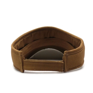 Detail view of adjustable velcro strap on camel sun visor hat for perfect head size fit