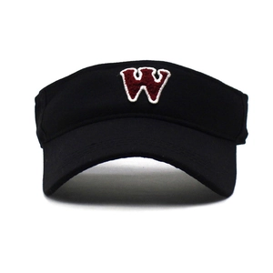 Detail of red embroidered W letter on black sports sun visor hat with white trim outline