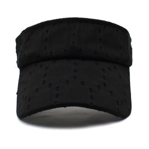 Women's black open top sun hat with floral laser-cut patterns and adjustable visor