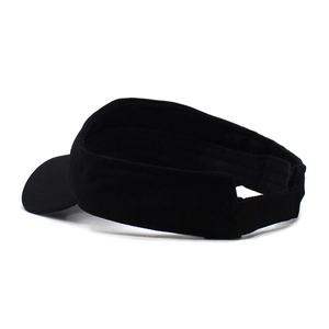 Detail view of the adjustable velcro strap and inner structure on a black sports sun visor
