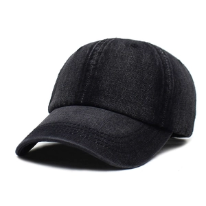 Distressed washed denim baseball cap in charcoal black with pre-curved brim and six-panel crown