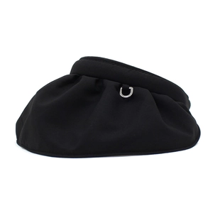 Detail of black sun visor featuring pleated fabric and a silver metal buckle accent