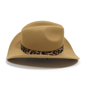 Detail view of khaki cowboy hat featuring a stylish leopard print band and felt texture