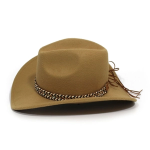 Detail of camel western cowboy hat featuring ethnic woven band and brown leather tassels