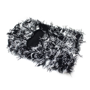 Black and white distressed knit balaclava with long faux fur texture for winter warmth