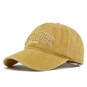 Gele baseballpet van gewassen katoen met 3D New York borduursel en vintage distressed look