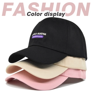 Detail of embroidered LOVE letters and decorative stripes on breathable cotton baseball caps