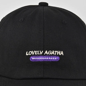 Black cotton baseball cap featuring white LOVELY AGATHA embroidery and purple detail