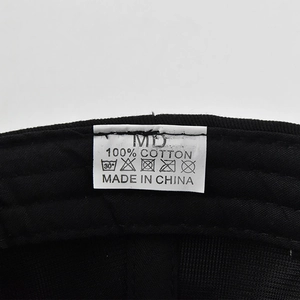 Detail shot of the internal cotton lining and wash care label on a vintage baseball cap