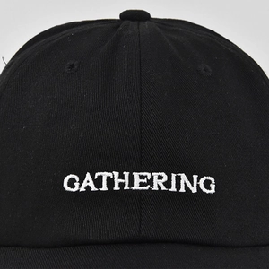 Classic black cotton baseball cap with white GATHERING 3D embroidery on the front crown