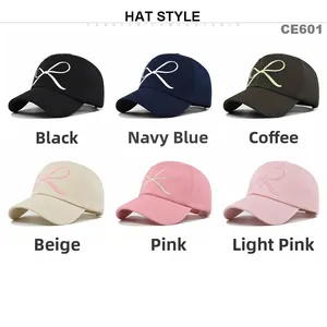 Collection de casquettes de baseball à broderie nœud en noir, marine, beige et rose