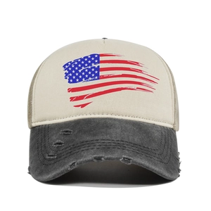 Detailed macro view of vintage distressed American flag baseball cap with mesh design