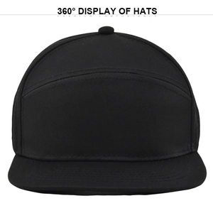 Front view of a minimalist 5-panel black flat brim snapback hat in premium woven fabric