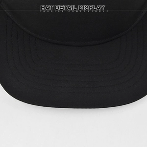 Detail view of black snapback hat brim with five rows of high-quality parallel stitching