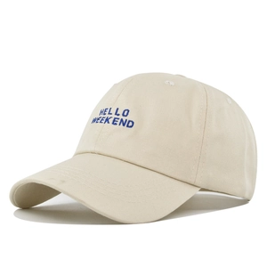 Detailed close-up of blue Hello Weekend embroidery on beige cotton canvas baseball cap