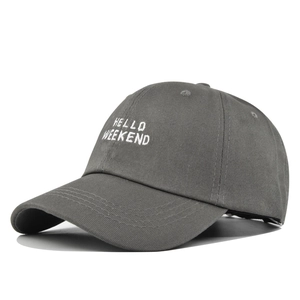 Detailed view of high-quality white HELLO WEEKEND embroidery on grey baseball cap