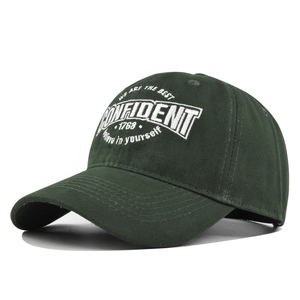 Classic dark green baseball cap with white Confident embroidery and pre-curved visor