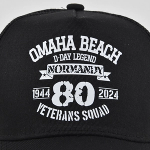 Detail of Omaha Beach 80th anniversary printed logo on black breathable mesh cap