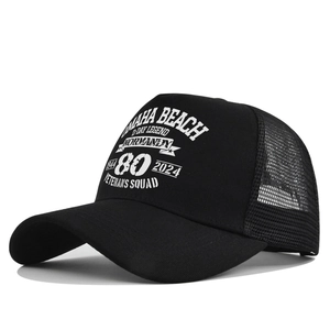 Macro detail of breathable mesh fabric and printed logo on black memorial trucker hat