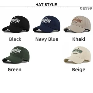 Detail view of cotton baseball caps with CONFIDENT embroidery in five various colors