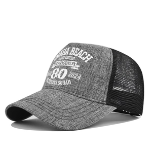 Detail of grey mesh trucker hat with Omaha Beach Normandy 80th anniversary printing
