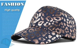 Detail of vintage navy denim baseball cap with rose gold metallic leopard print pattern