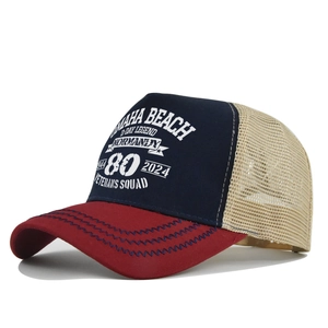 Close-up of vintage Omaha Beach 80th anniversary mesh trucker hat with detailed embroidery