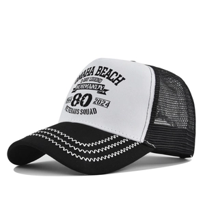 Detail of Normandy Veterans Squad silk screen print on mesh trucker cap with wavy stitching