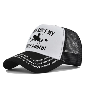 Detail of custom printed trucker hat with breathable black mesh and contrast stitching