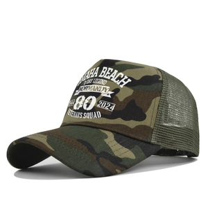 Detail of Omaha Beach 80th anniversary print on camo mesh trucker baseball cap