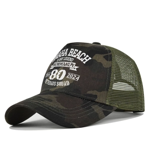 Detail of Normandy 80th anniversary print on camo mesh trucker cap with Omaha Beach text
