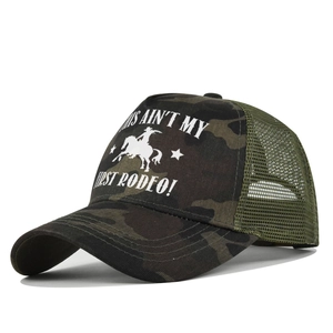 Detail of camouflage trucker hat showing silk screen print and breathable mesh back