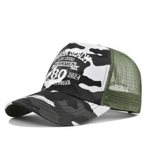Detail of Normandy 80th anniversary trucker hat with camo pattern and green mesh