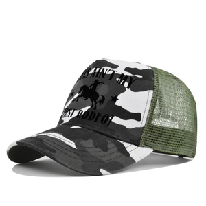 Detail view of camouflage trucker hat with breathable green mesh and rodeo print