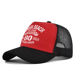 Detail view of red and black mesh trucker hat with Omaha Beach 80th anniversary printing
